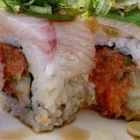 Yellowtail Delight Roll · Yellowtail, cucumber roll wrapped in yellowtail with yuzu sauce and topped with jalapeno, ci...
