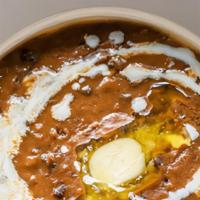 Bowled Daal Makhani · Gluten free. Vegetarian.  Assorted lentils, tomatoes, ginger, garlic, butter, cream.  
All b...