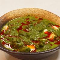 Saag Paneer · Gluten free, vegetarian. Spinach puree, cubed paneer, onion, tomato, and cream. Served with ...