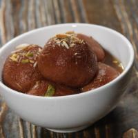 Gulab Jamun (2 Pcs) · Dumplings, dried milk, cardamom syrup.