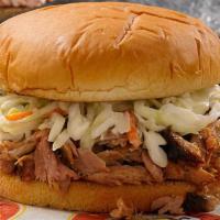 Smothered Pork Sandwich · Chopped BBQ Pork topped with Coleslaw.