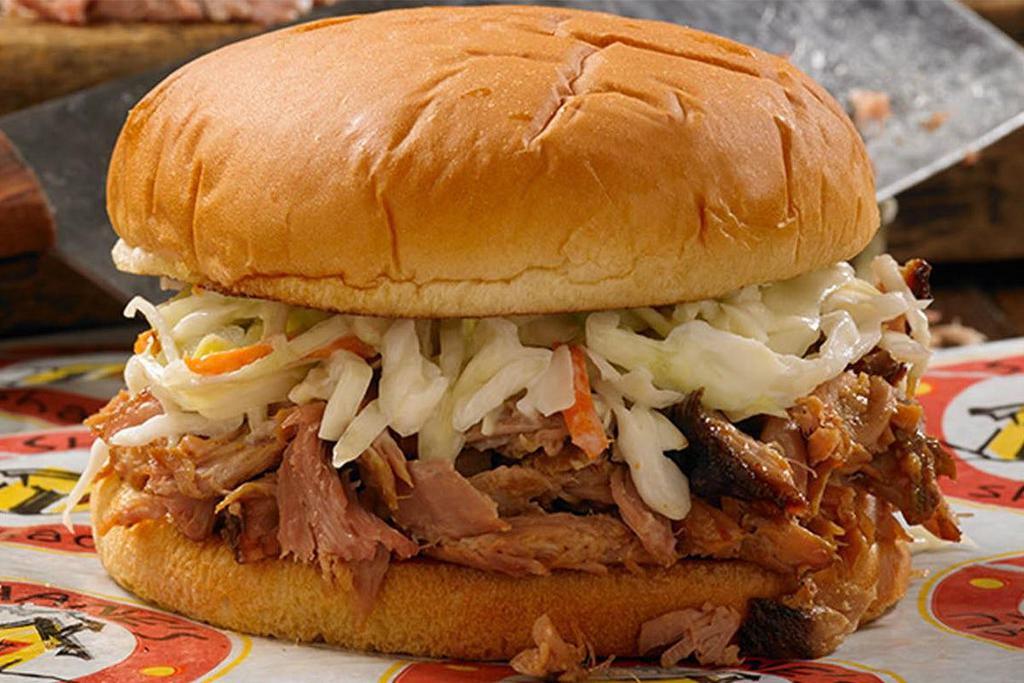Smothered Pork Sandwich · Chopped BBQ Pork topped with Coleslaw.
