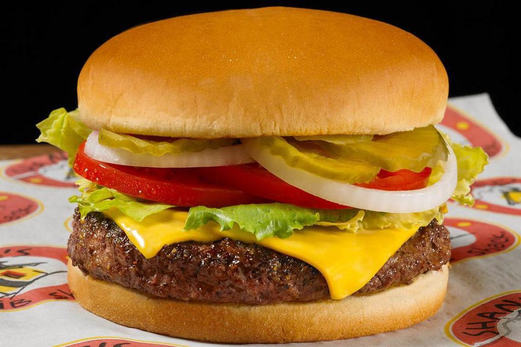 All-American  · 1/2 lb. Fresh Ground Beef Burger with American Cheese and Choice of Lettuce, Tomato, Onion, & Pickles