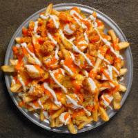 Loaded Buffalo Shack Fries · Fries loaded with Shredded Cheddar Jack Cheese, Chopped Fried or Grilled Tenders tossed in M...