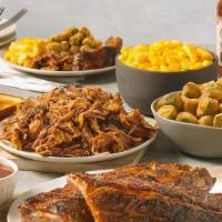 Mega Meal Deal · 2 Half Racks, 1 LB Chopped BBQ Pork or Chicken, 2 Large Sides, Bread, and BBQ Sauce. . **Ava...