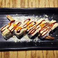 Shrimp Crunch Roll · Cucumber, crab stick, avocado, tempura shrimp.
(Top) tempura flakes, eel sauce & spicy mayo.