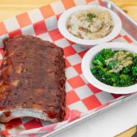 Bbq Baby Back Ribs · Slow roasted, tender to the bone, basted in sweet & tangy BBQ sauce. Half Rack. Served with ...