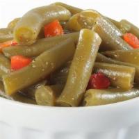 Green Beans - 10:30 To Close · Green beans cooked up with red peppers in a smoky broth. .