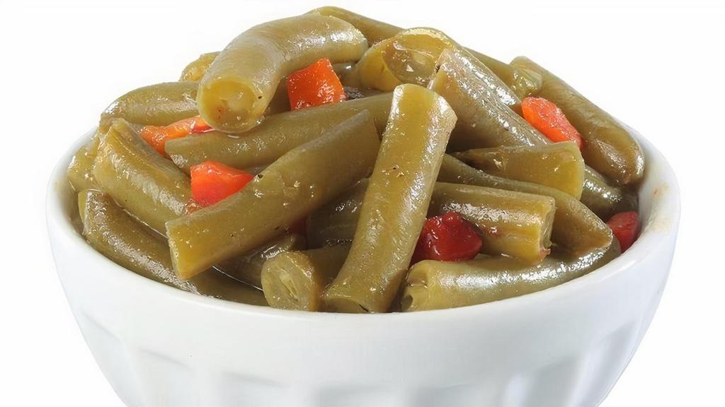 Green Beans - 10:30 To Close · Green beans cooked up with red peppers in a smoky broth. .