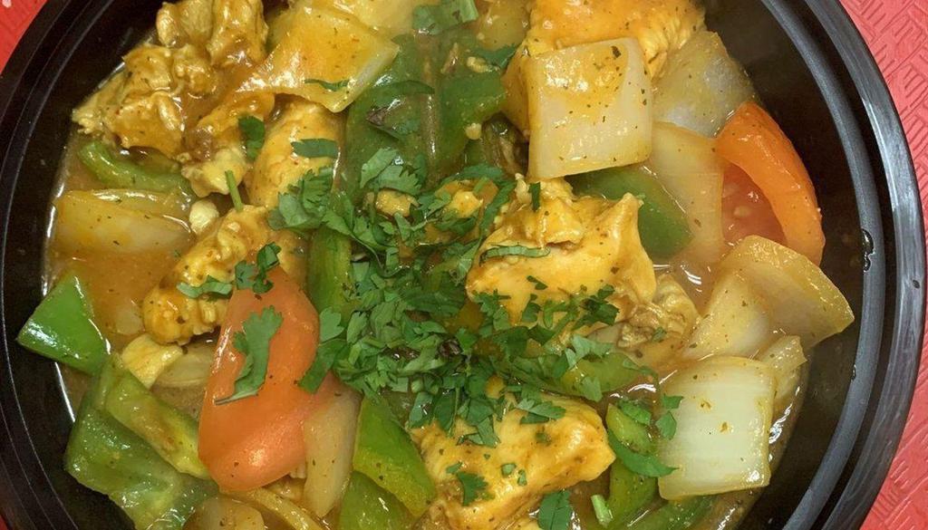 Chicken Kadai · Boneless pieces of chicken cooked with green bell pepper, tomatoes and onions.