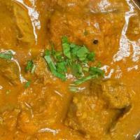 Chicken Madras · Boneless pieces of chicken cooked with south Indian spices flavored with fresh coconut milk ...