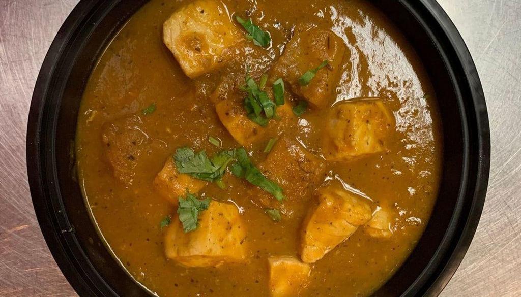 Fish Vindaloo · A traditional dish from the south of India, cooked in a tangy vinegar & garlic pepper sauce.(Mahi fish and potato)