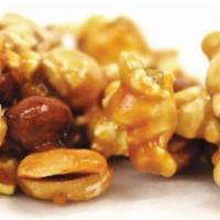 Peanut Caramel Corn · Spanish peanuts and freshly-popped corn covered with our home-made copper-kettle caramel.