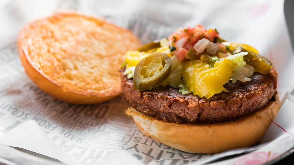 Beyond Burger W House Salad Or Fuddfries · Plant-based burger that satisfies like beef. Served with house side salad or Fudd fries. 730 cal.