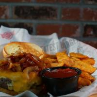 Bbq Burger · 100% all-American premium cut 1/2 pound beef burger. Topped with grilled onions, cheddar che...