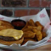 Three Cheese Burger · 100% all-American premium cut 1/2 pound beef burger. Topped with cheddar, provolone, and swi...