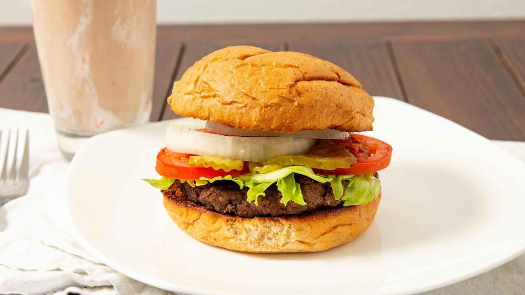 Buffalo Burger · Antibiotic-free, hormone-free, pasture-raised, 100% all-natural.  Served with lettuce, tomatoes, onion and pickles on the side.