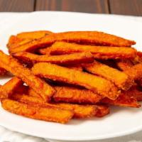 Sweet Potato Fries · Condiments delivered on the side.