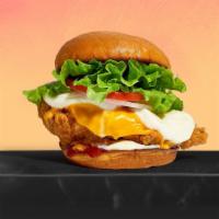 Cheesy Chicken Sandwich · Cheddar, mozzarella, fried chicken breasts, lettuce, tomato, red onion, mayo, ketchup on a w...