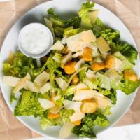 The Caesar Salad · Romaine lettuce, house croutons, and parmesan cheese with Caesar dressing