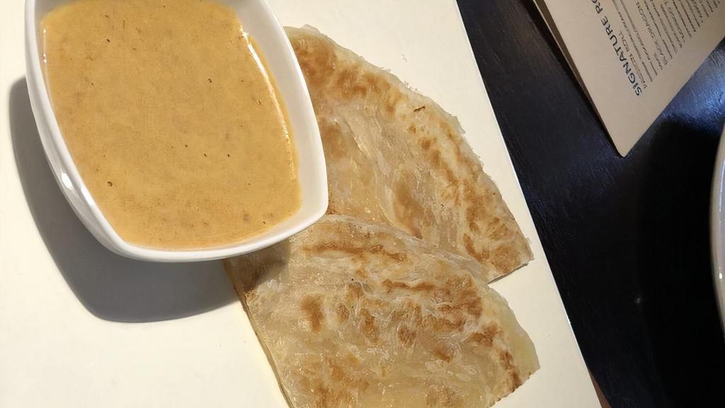 Malaysian Roti · flat bread served with special curry sauce