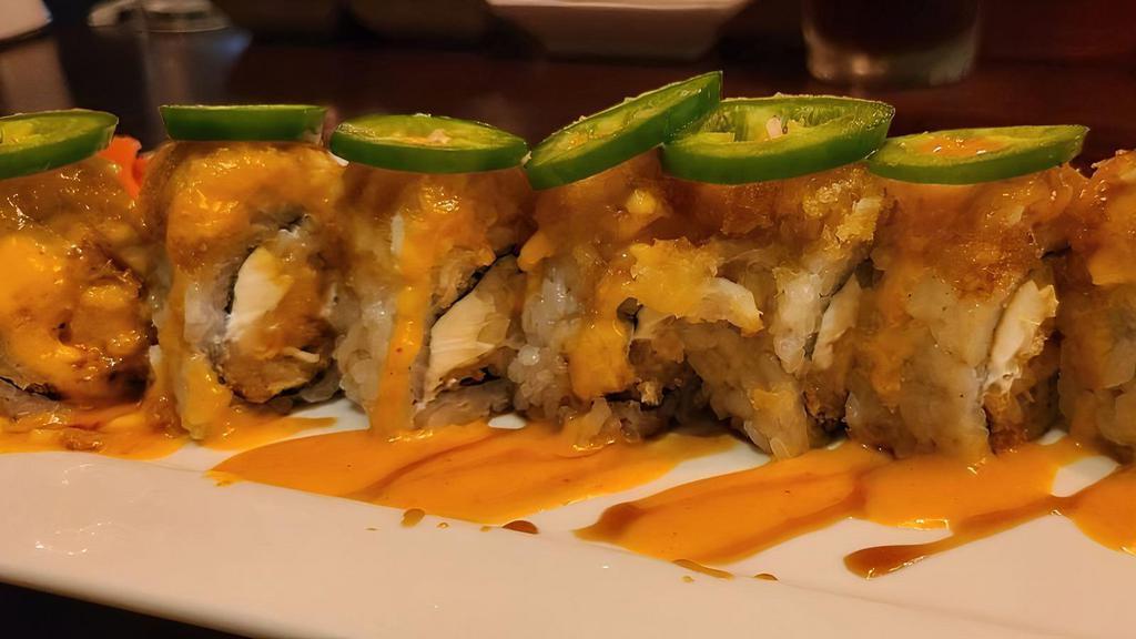 Lonely Christmas · Tempura Lobster with cucumber & cream cheese, topped with jalapeno, crab meat, eel sauce & spicy mayo.