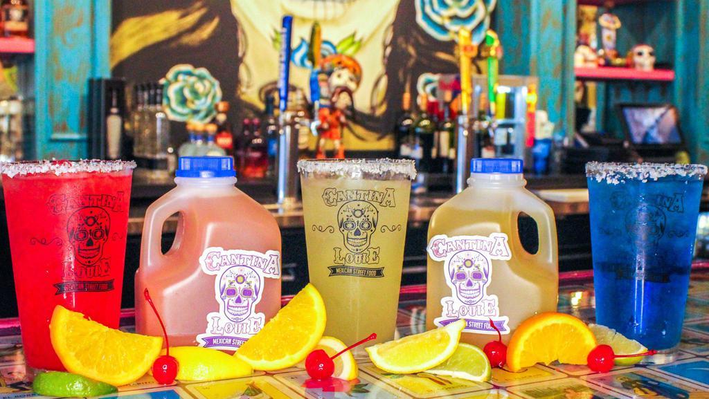 Fat Louie(4 Margarita Drinks)  · 32oz (4 drinks) of our margarita louie.  Available in either lime/regular, mango, peach, rasberry, banana, pomegranate or strawberry flavor.