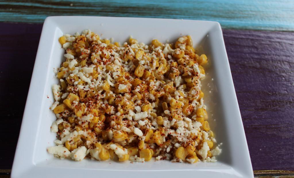Mexican Esquite · Corn tossed with mayonnaise, a blend of Mexican spices,Cilantro and queso fresco.
