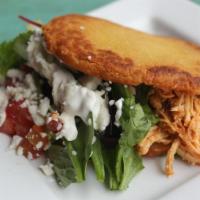 Gordita · These “little fatties” feature a thick corn pocket stuffed with shredded chicken, lettuce, t...