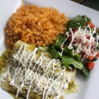 Avocado Enchilada Entree · Corn tortillas stuffed with avocado and shredded cheese. Topped with green tomatillo salsa, ...