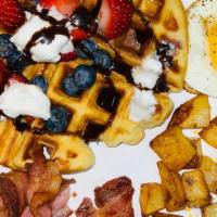 Ultimate Hotspot Platter · choice of Belgium waffle, french toast, pancakes, or Crepes ) served with 2 egg's cooked any...