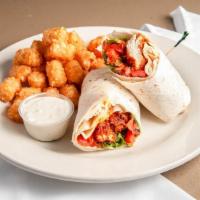 Buffalo Tender Wrap · Spicy tenders or grilled chicken wrapped with lettuce, tomato, Jack cheese, and a side of bl...