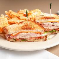 Concourse Athletic Club · Ham and turkey on wheat with bacon, American, cheddar, lettuce and tomato