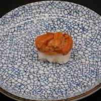 Unagi Nigiri  (1 Piece) · A slice of Unagi (Fresh Water Eel) grilled with a sweet sauce on a ball of sushi rice.  A cr...
