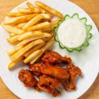 6 Pieces Wings With French Fries And 12 Oz Soda · Served with dressing and celery