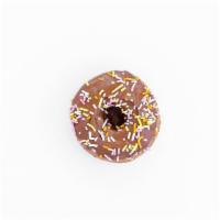 Milk Chocolate Sprinkles · Dipped in milk chocolate and topped with naturally dyed sprinkles