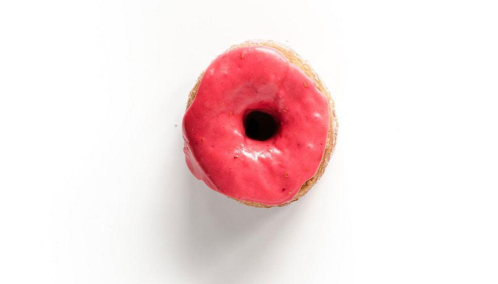 Triple Raspberry · Rolled in raspberry sugar, infused with house-made raspberry jam, topped with a lemony raspberry glaze