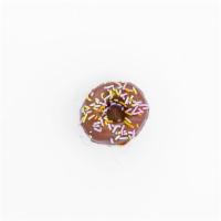 Mini Milk Chocolate Sprinkles · Dipped in milk chocolate and topped with naturally-dyed sprinkles