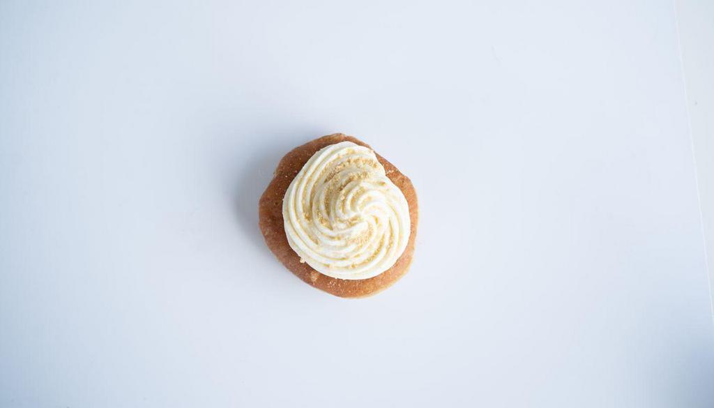 Yeast Raised - Lemon Icebox (Filled) · Infused with a creamy lemon curd, topped with icebox whip and garnished with graham cracker crumbs