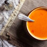 Tomato Soup · Tomatoes blended with a hint of cream and herbs and spices.