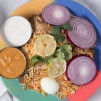 Guntur Chicken Biryani · Saffron Flavoured Basmati Rice with House blend Boneless spiced chicken