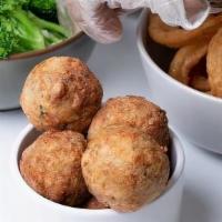 Boudin Balls · Our spin on a Louisiana classic comfort food, Cajun ground pork combined with rice, seasoned...