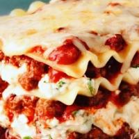 Meat Lasagna · Sausage, beef, pepperoni, marinara, ricotta, and mozzarella.
