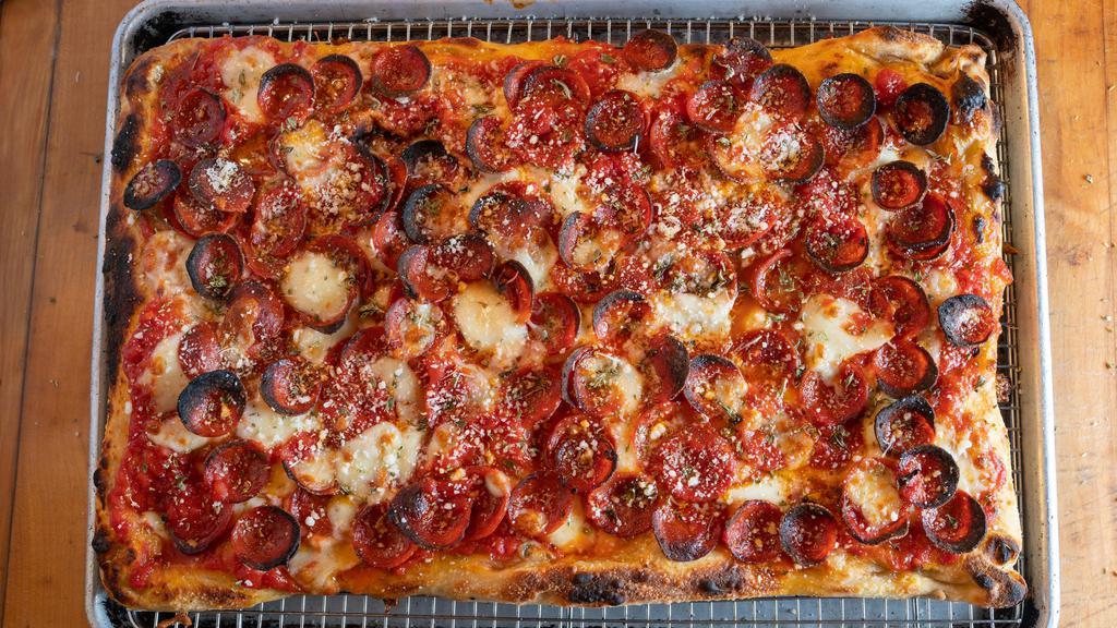 Pepperoni · Organic tomato, fresh mozzarella, charred pepperoni