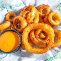 Beer-Battered Onion Rings · Served with our spicy dipping sauce. (1270 Cal)
