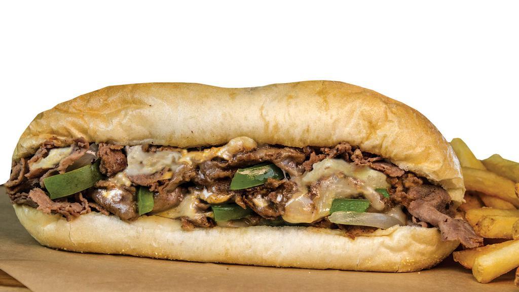 Philly Cheesesteak · Thinly shaved steak grilled with green peppers and onions. Topped with Provolone cheese on a hoagie roll. Served with your choice of side.