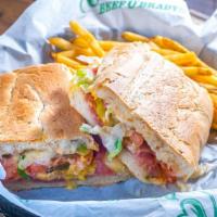 Cuban · Ham, salami and Swiss cheese served on authentic Cuban bread with lettuce, tomato, pickle, m...