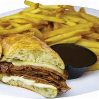 Prime Rib Sandwich · Tender, flavorful and perfectly seasoned Prime Rib, sliced thin, topped with smoked Gouda ch...