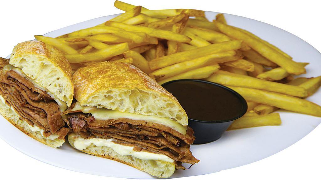 Prime Rib Sandwich · Tender, flavorful and perfectly seasoned Prime Rib, sliced thin,
topped with choice of cheese and creamy horseradish
sauce served on a Ciabatta bun. Served with a side of au jus.