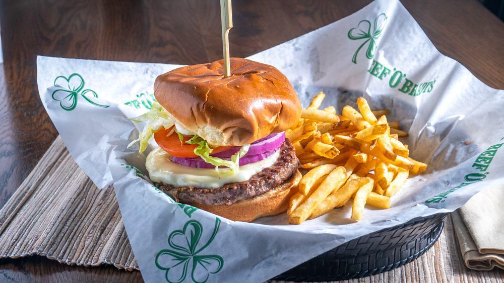 The 'O' Brady Burger · ☘️Angus seasoned with a blend of herbs and spices, topped with melted provolone cheese and served with mayo, lettuce, tomato, pickle and onion. (1320 Cal)